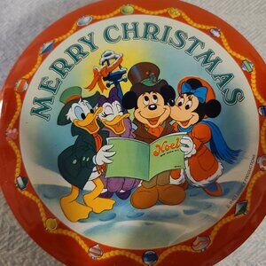 Vintage Walt Disney Merry Christmas candy tin featuring Mickey, Pluto